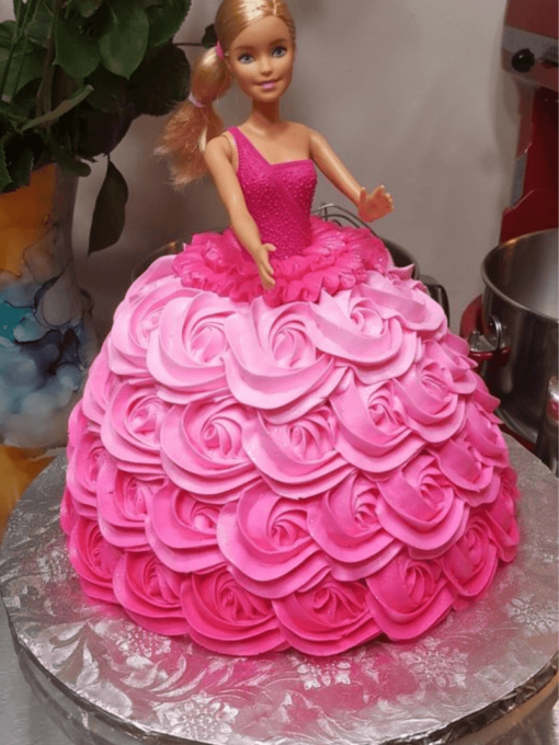 Barbie doll with frock theme cake