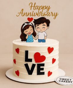 Make your anniversary special with our romantic anniversary cake. It showcases a cute couple surrounded by hearts, symbolizing love and togetherness.