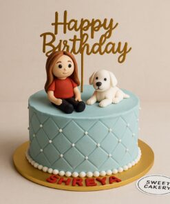 Cute birthday cake with fondant girl and white dog topper, quilted cream design