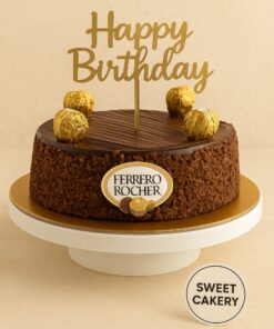 Ferrero Rocher birthday cake with gold-wrapped truffle and chocolate ganache finish