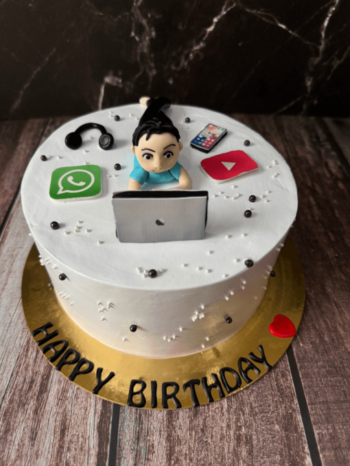 Techie working on laptop Cake