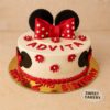 Minnie Mouse theme birthday cake by Sweet Cakery featuring red bow, Minnie ears, and floral decorations, custom cake for young girls in Bangalore
