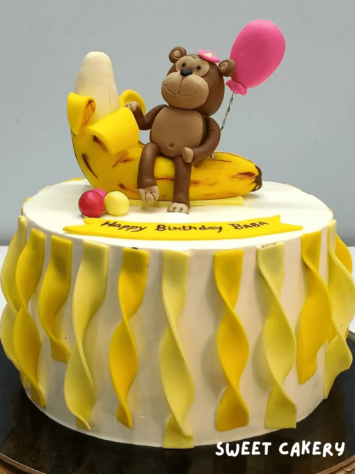 Monkey on Banana Birthday Cake