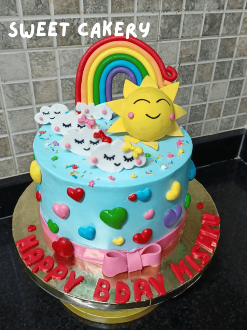 Sun and rainbow theme cake