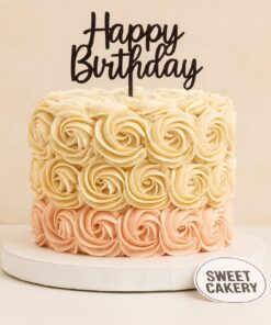 Rose swirl birthday cake with pastel pink and cream rosettes, Sweet Cakery branding, elegant floral design, 100% eggless, Bangalore.
