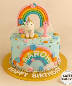 Unicorn Rainbow Cake for birthdays in Bangalore by Sweet Cakery. Custom design with rainbow & unicorn topper
