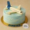 3D aeroplane theme birthday cake with fondant jet on blue buttercream