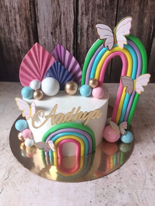 Rainbow with butterflies cake