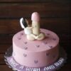 Funny adult-themed bachelorette cake with fondant bride and bold topper design