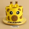 Giraffe themed birthday cake with fondant eyes and brown spots. Delivery Across Bangalore