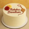 Raksha Bandhan special cake with handcrafted rakhi and marigold flowers, eggless festive cake by Sweet Cakery Bangalore