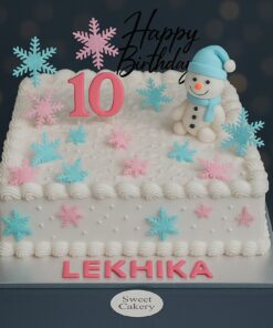 Snowman Birthday Cake in Bangalore – Eggless winter theme cake with snowflakes and snowman topper by Sweet Cakery