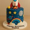 Space Theme Birthday Cake with rocket, planets, stars, and rainbow