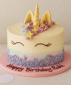 Unicorn birthday cake with golden horn, pastel swirls, and sprinkles – Sweet Cakery Bangalore
