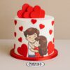 A single-tiered heart-themed red velvet cake with a couple topper, perfect for Valentine’s Day or anniversaries, handcrafted by Sweet Cakery Bangalore
