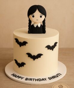 Wednesday Theme Birthday Cake with handmade topper and bats