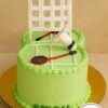 Badminton theme birthday cake by Sweet Cakery, showing a green court design with rackets, shuttle, and net. Sports themed custom cake in Bangalore.