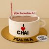 Round chai theme birthday cake by Sweet Cakery with white and brown buttercream, "I ❤️ CHAI" fondant design, banner topper