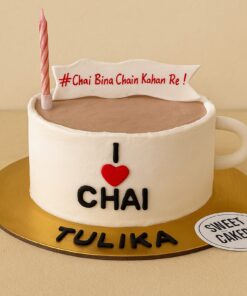 Round chai theme birthday cake by Sweet Cakery with white and brown buttercream, "I ❤️ CHAI" fondant design, banner topper