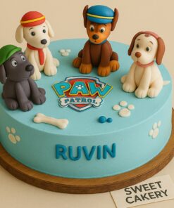 A 100% eggless Paw Patrol birthday cake by Sweet Cakery featuring handcrafted fondant pups, paw prints, edible bone elements.