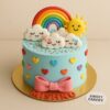 Rainbow sunshine birthday cake with rainbow topper, smiling sun, fondant clouds, colourful hearts, and Sweet Cakery branding in Bangalore