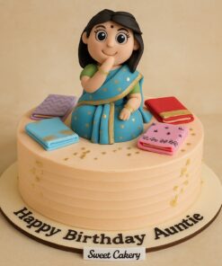 Saree lover birthday cake with fondant lady topper in blue saree, surrounded by colourful sarees, with Sweet Cakery branding in Bangalore.