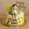 Tennis theme birthday cake for boys in Bangalore. 100% eggless, handcrafted design with tennis balls & racket. Sweet Cakery exclusive.