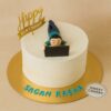 Work From Home theme birthday cake with laptop and figurine design on cream finish from Sweet Cakery Bangalore, custom cake for modern celebrations.