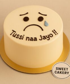 Farewell cake from Sweet Cakery with cream finish, sad face design and blue tear detail