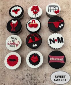 Bold red and black Naughty Nights cupcakes from Sweet Cakery, featuring lingerie, lips, hearts, and playful adult party decorations.