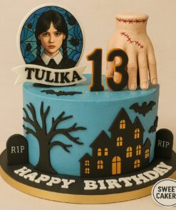 Spooky Wednesday Addams themed birthday cake with haunted house, bats, stitched hand topper, and custom topper by Sweet Cakery Bangalore