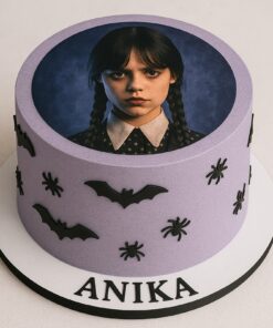 Spooky Wednesday theme birthday cake with circular edible photo print, bats, and spiders from Sweet Cakery Bangalore