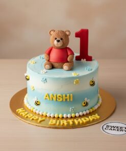 Adorable teddy bear 1st birthday cake with bees and flowers from Sweet Cakery Bangalore
